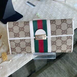 Gucci double snap cherry line long wallet in good condition